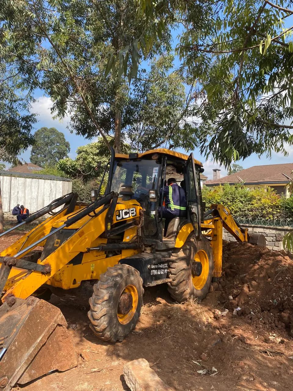 Georex trainee practising site preparation with a JCB backhoe loader